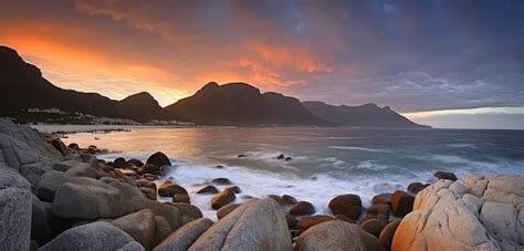 premium ai image  sunset   mountains   ocean