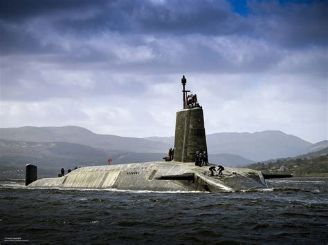 Royal Navy Vanguard Class submarine HMS Vigilant returning to HMNB ...