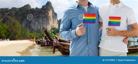 Close Up Of Male Gay Couple With Rainbow Flags Stock Image Image Of Marriage Homosexuality