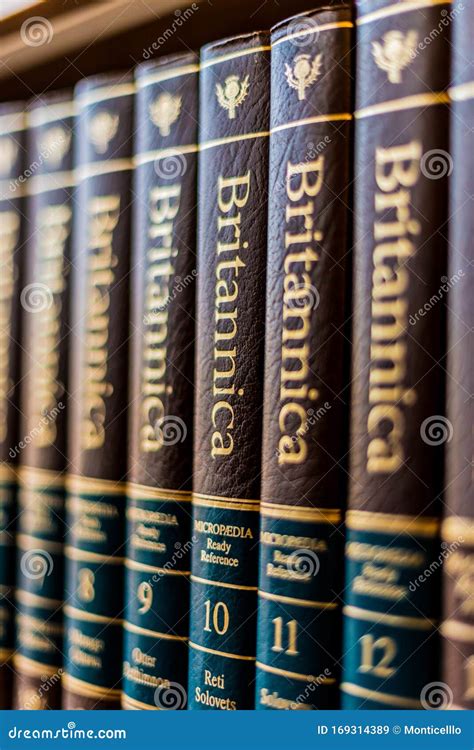 Encyclopedia Britannica Volumes On A Shelf In A Public Library