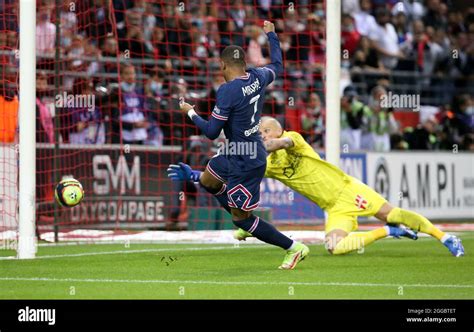 Kylian Mbappe Of Psg Scores His Second Goal Against Goalkeeper Of Reims