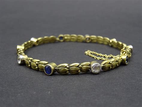 Bracelet accidenté en or jaune 750 millièmes orné de diamants de