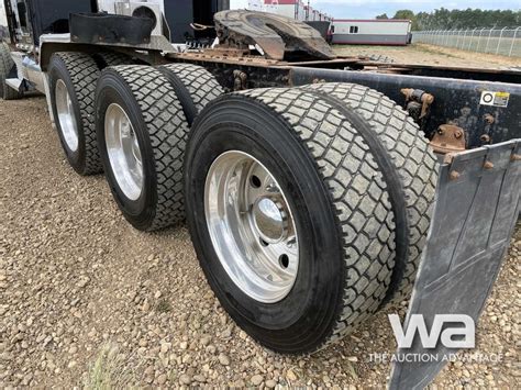 Kenworth W Sleeper Tri Drive Truck Tractor