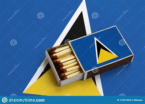 Saint Lucia Flag Is Shown In An Open Matchbox Which Is Filled With