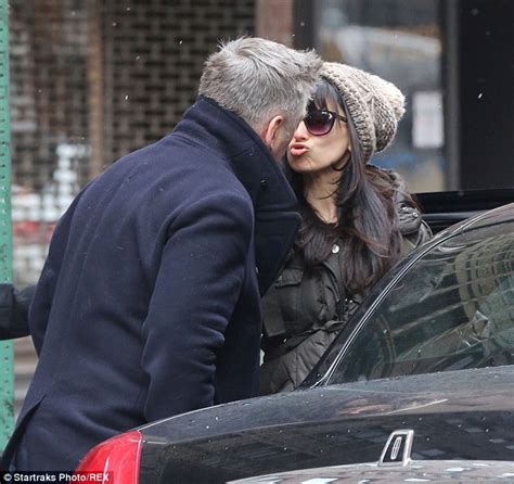 Alec Baldwin And Pregnant Wife Hilaria Share A Kiss In The Snowy