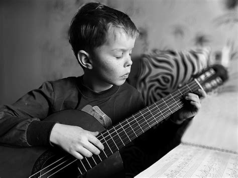 Premium Photo Boy Playing Guitar