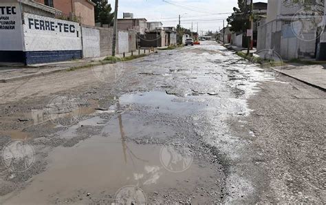 Galer A Fuga De Aguas Negras Crea Grandes Hoyos En Calle De