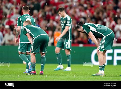 northern ireland players  dejected  defeat   uefa