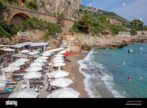 Sunbaking and swimming at Balzi Rossi in Ventimiglia Stock Photo - Alamy