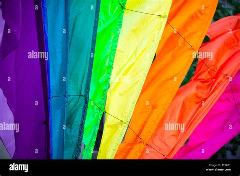 Rainbow Flag Parachute Fabric Fills The Frame For A Colorful Background Of Gay Pride