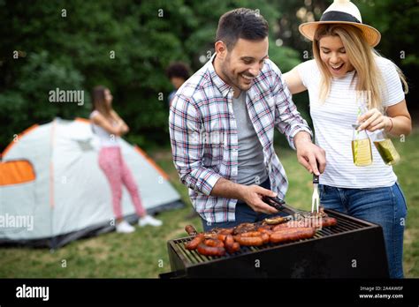 Friends Having Fun In Nature Doing Bbq Stock Photo Alamy