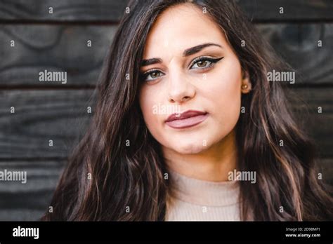 Portrait Of A Beautiful Brunette Girl With Hazel Eyes Stock Photo Alamy