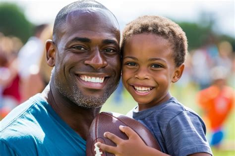 Premium Photo Smiling African American Father And Son Enjoying