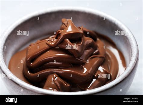 Melting chocolate, melted delicious chocolate for praline icing ...