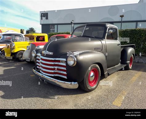 View Of An Old Black 1947 Chevrolet Thriftmaster Pickup Truck Advance Design In A Parking Lot