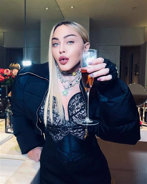 Madonna strips topless for jaw-dropping snap as she hits back at being