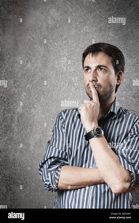 Portrait Of Thoughtful Man Looking Up Vertical Stock Photo Alamy