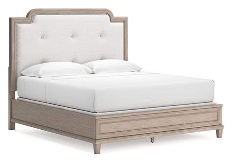 Jorlaina King Upholstered Panel Bed