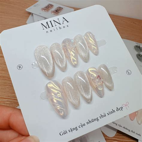 Móng úp thiết kế M mắt mèo nâu nude tráng gương vẽ nổi đính charm bướm Mina nail Shopee