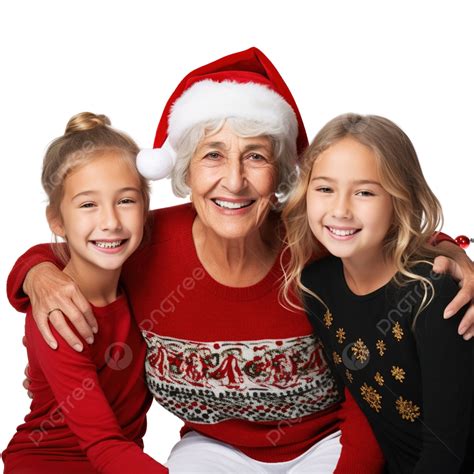 Smiling Granddaughters With Grandma Sitting Together At Christmas