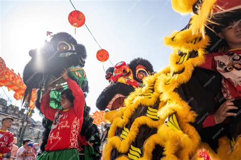 Premium Photo Dragon And Lion Dance Show In Chinese New Year Festival