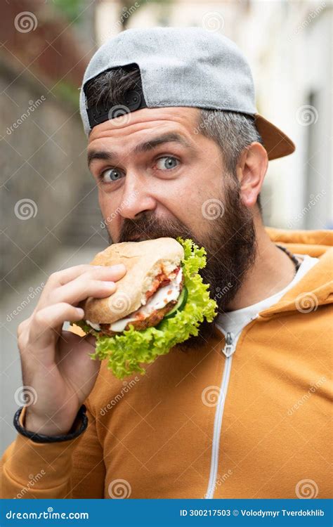 Bearded Guy Eats Fast Food Burger Is Not Helpful Food Very Hungry Guy