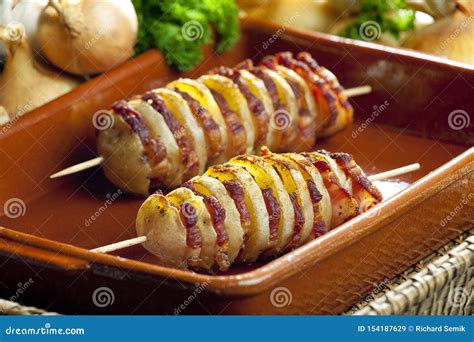 Potato skewers with bacon stock image. Image of closeup - 154187629