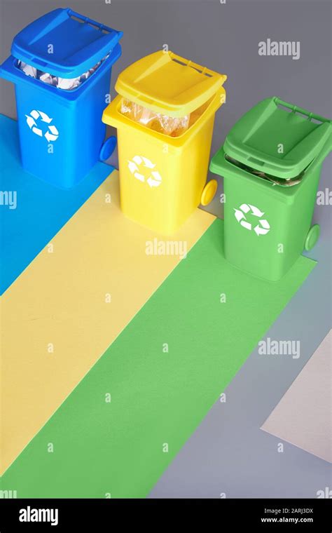 Three Color Coded Recycle Bins Isometric Picture On Geometric Layered