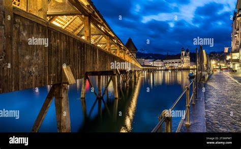 Chapel Bridge Over The Reuss River In Lucerne Switzerland Stock Photo