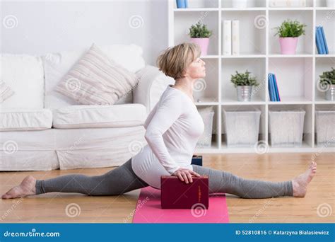 Mature Woman Doing The Splits Stock Photo Image