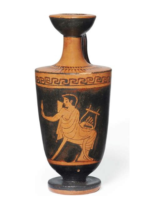 An Attic Red Figured Lekythos Circa B C With Seated Youth Head