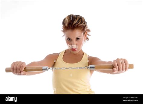 Woman With Nunchaku Stock Photo Alamy