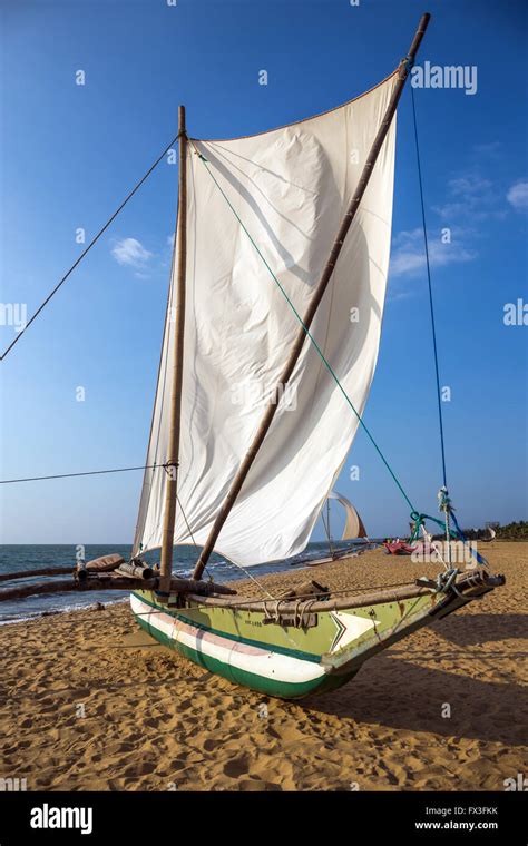 View Of Traditional Outrigger Fishing Boat Oruva With Sail On Negombo