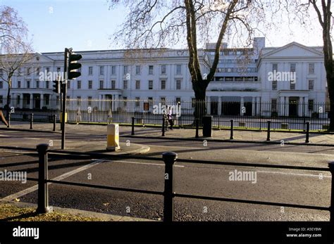 People walking pass the Wellington Barracks London Stock Photo - Alamy