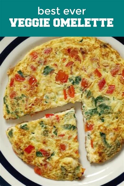 Veggie Omelette With Tomatoes Red Peppers Spinach And Cheese A Quick