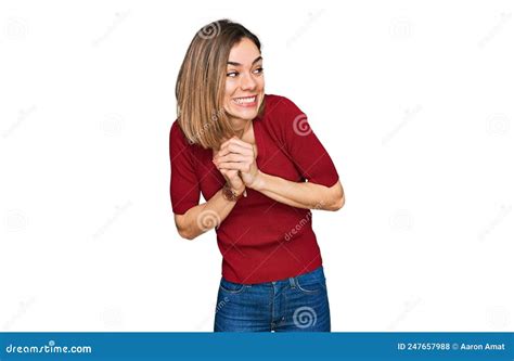 Young Blonde Girl Wearing Casual Clothes Laughing Nervous And Excited