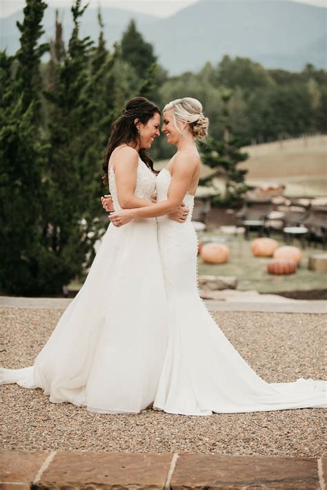 Brides Sharing Hug During Wedding Portraits at Hotel Domestique in