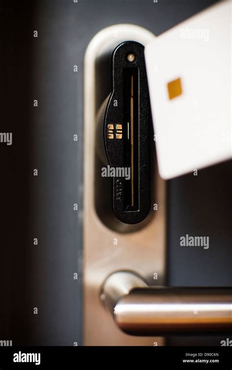 A door with a card key lock Stock Photo - Alamy