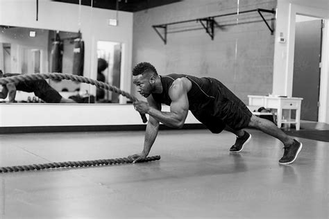 "Fit And Muscular African American Athlete Working Out With Exercise ...