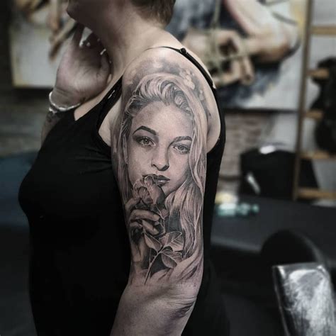 Realistic Woman Portrait Tattoo In Black And Grey On The Sleeve Made