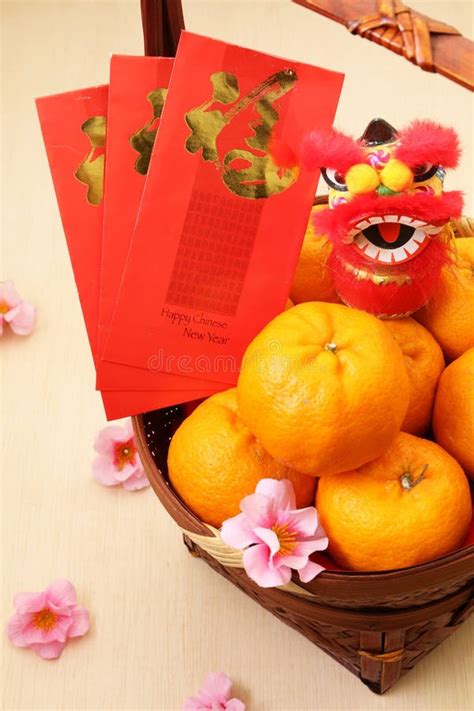 Mandarin Oranges in Basket with Chinese New Year Red Packets and Lion Doll - Series 3 Stock ...