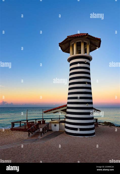 caribbean sea sunrise lighthouse Stock Photo - Alamy