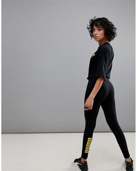 PUMA Leggings With Gold Logo In Black Lyst