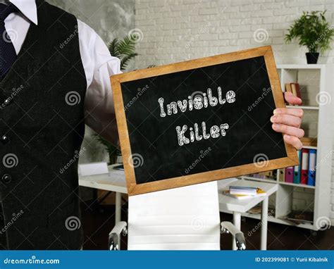 Financial Concept Meaning Invisible Killer With Sign On The Sheet Stock