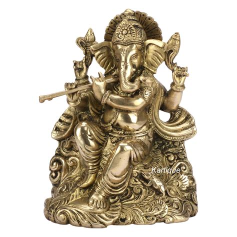 Buy Kartique Brass Lord Ganesha Playing Flute Sitting On Carved