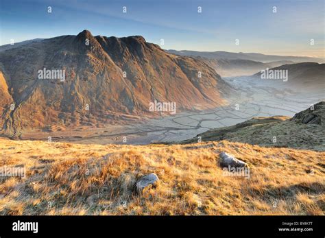 Winter sunlight on the Langdale Pikes and frosty Great Langdale Valley ...