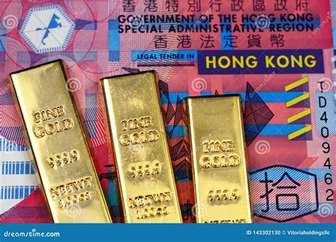 A Ten Hong Kong Dollar Bill With Three Gold Bars Stock Photo Image Of