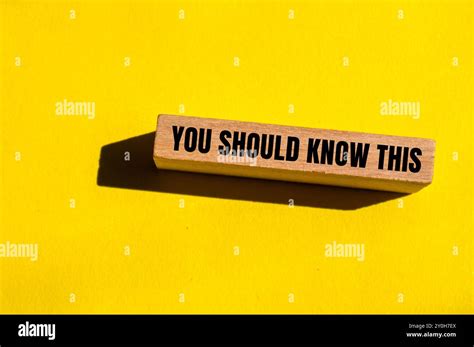 message written  wooden block  yellow