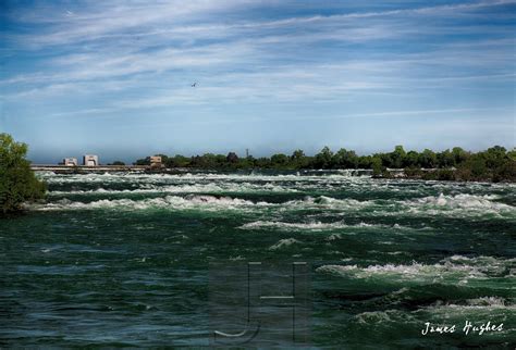 The Water Is Very Choppy And Green In This Photo It Looks To Be Moving