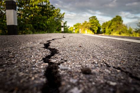 Earthquake Crack Road Stock Photos, Pictures & Royalty-Free Images - iStock